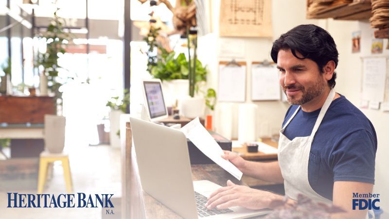 Blog – Business Check Fraud small business owner working on his finances