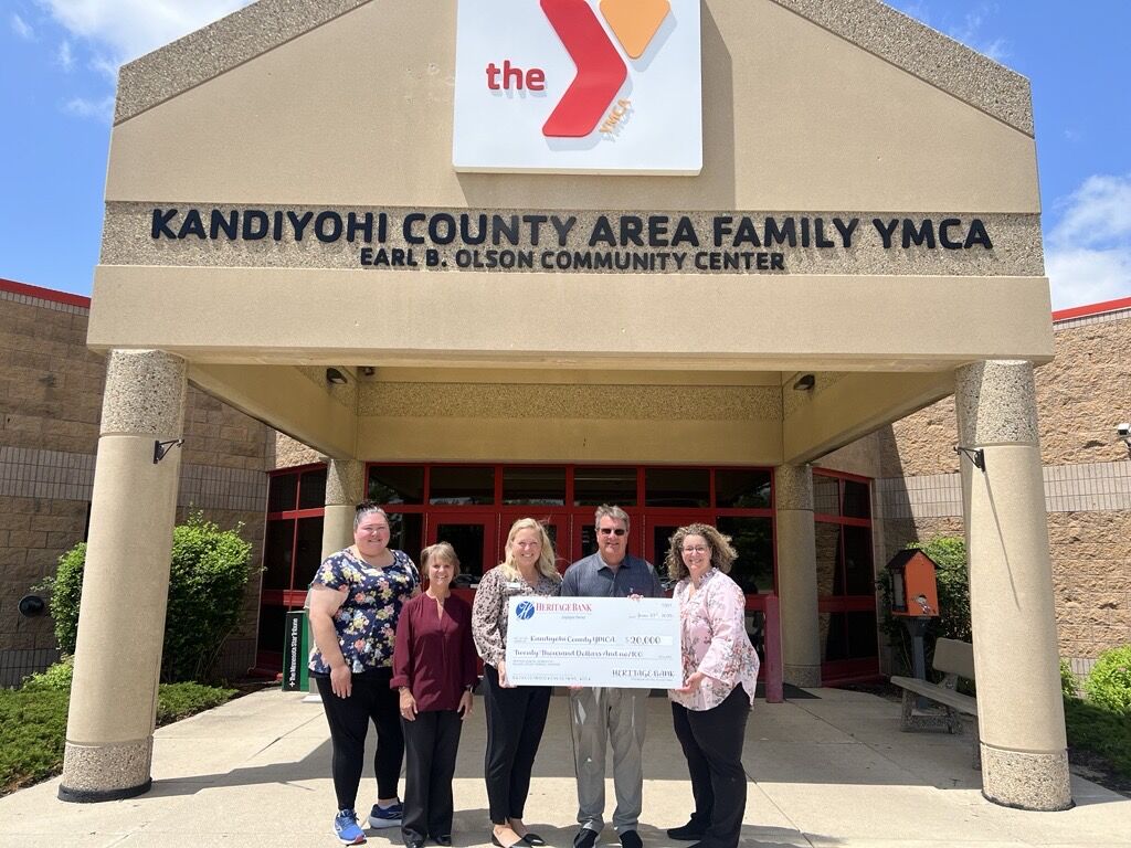 Heritage Bank grants a big check to the Kandiyohi Country Area Family YMCA