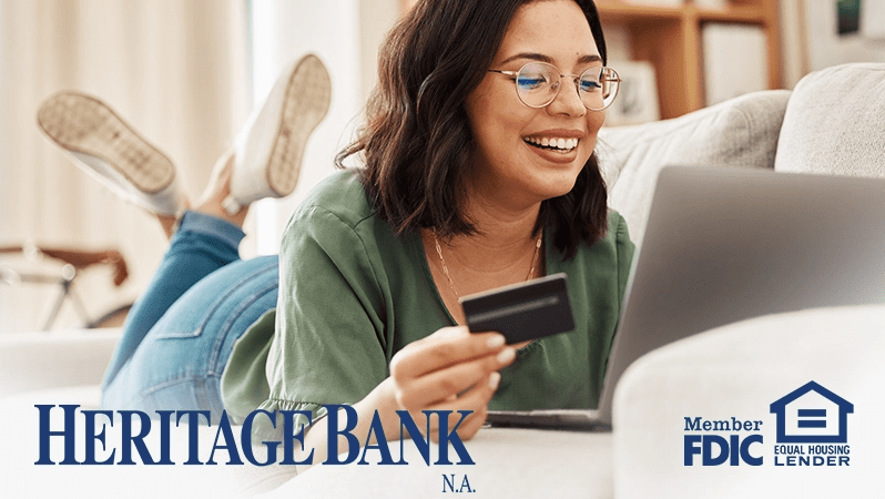 Woman shopping online with credit card