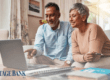 Couple looking at their computer