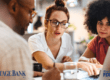 Group of people review how they can improve their credit score