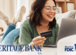 Woman shopping online with credit card