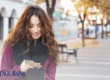 woman holding cash