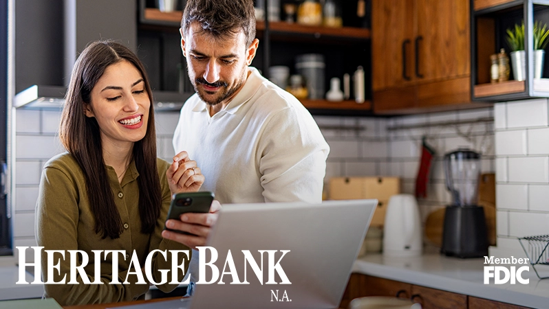 Couple looking over their escrow statement